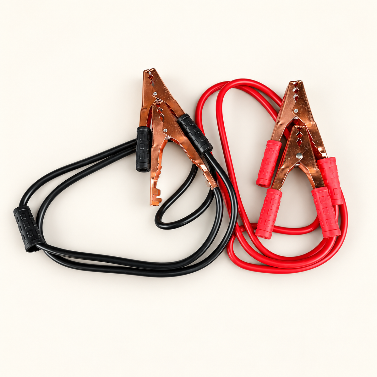 SMTE jumper cable pair on a warm off-white background