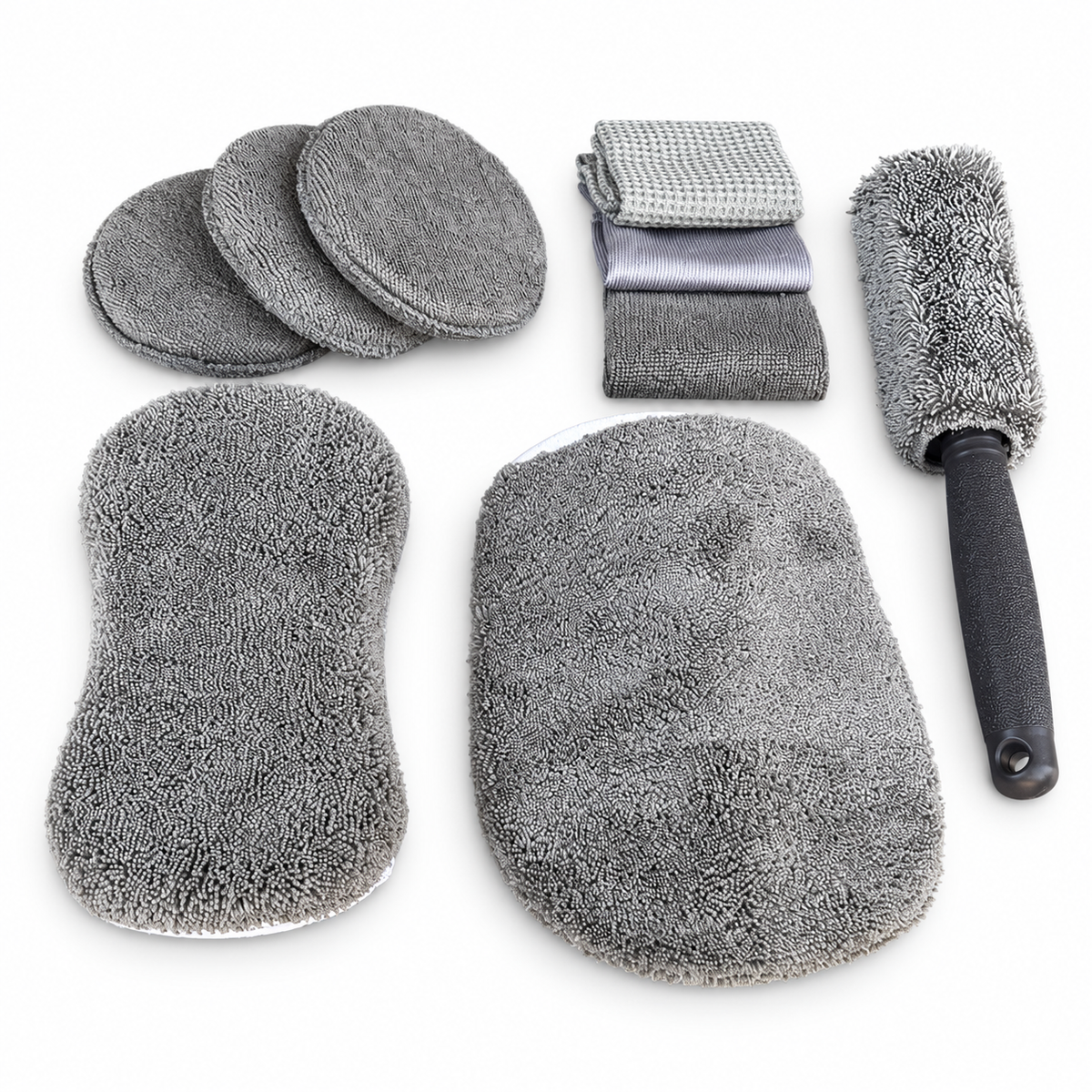 Nine-piece grey microfibre car wash kit laid out on a white background