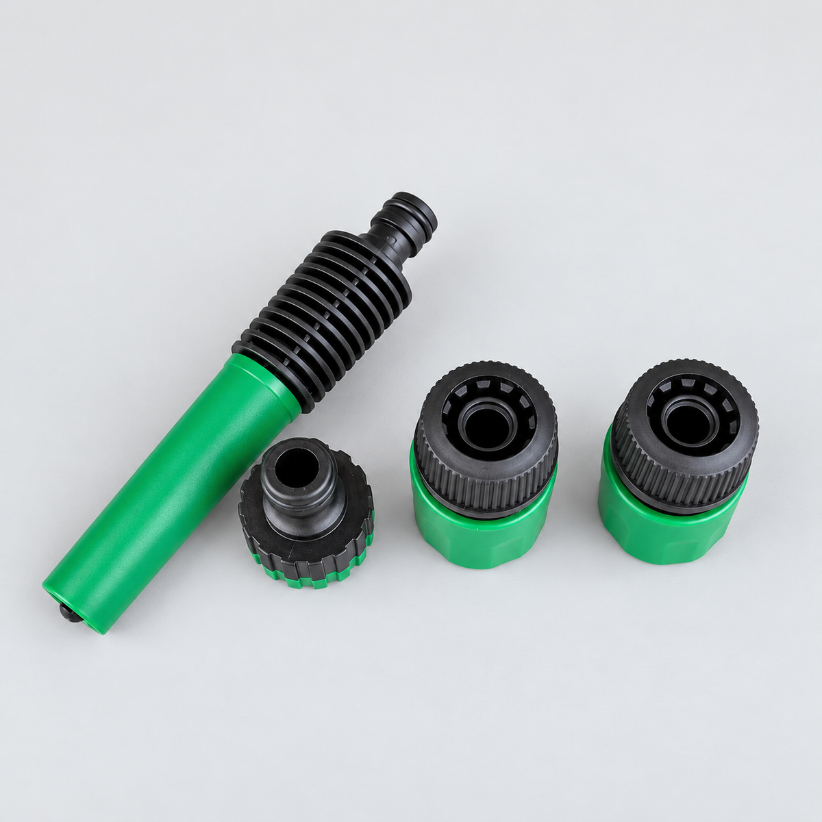 SMTE four-piece green and black garden hose spray nozzle and connector set