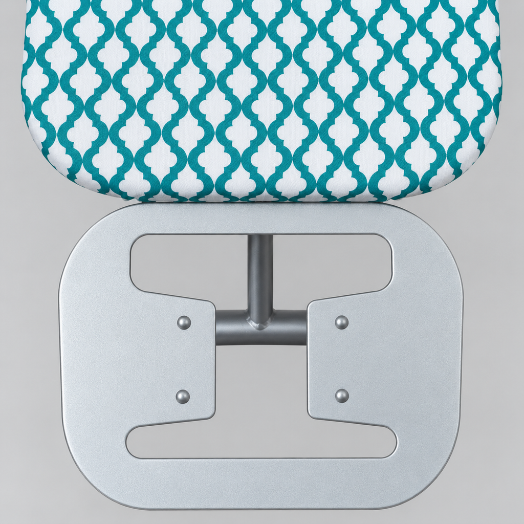 SMTE ironing board with green and white patterned cover and iron rest