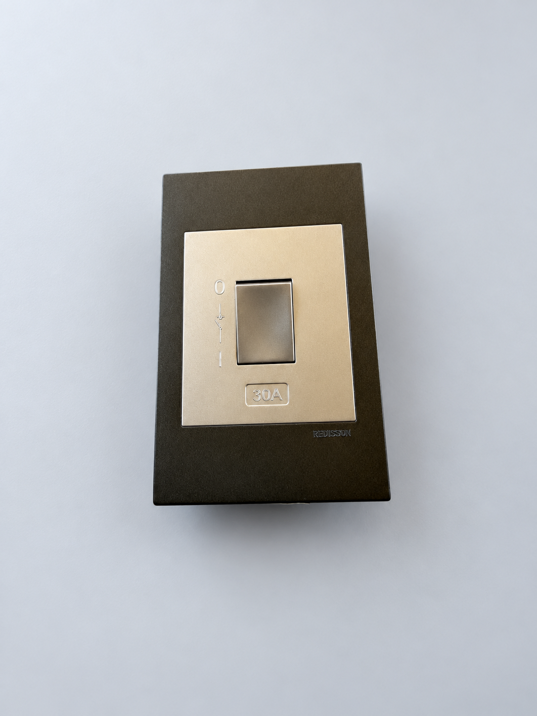 SMTE - 30A Single Rocker Wall Switch with Dark and Champagne Faceplate - studio view 2