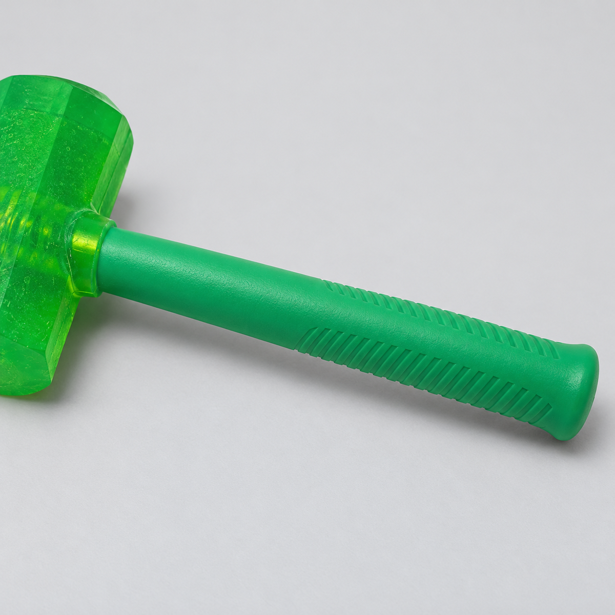 Green translucent mallet - grip view
